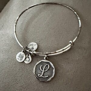 Alex and Ani Silver Charm Bracelet. Initial L need a cleaning